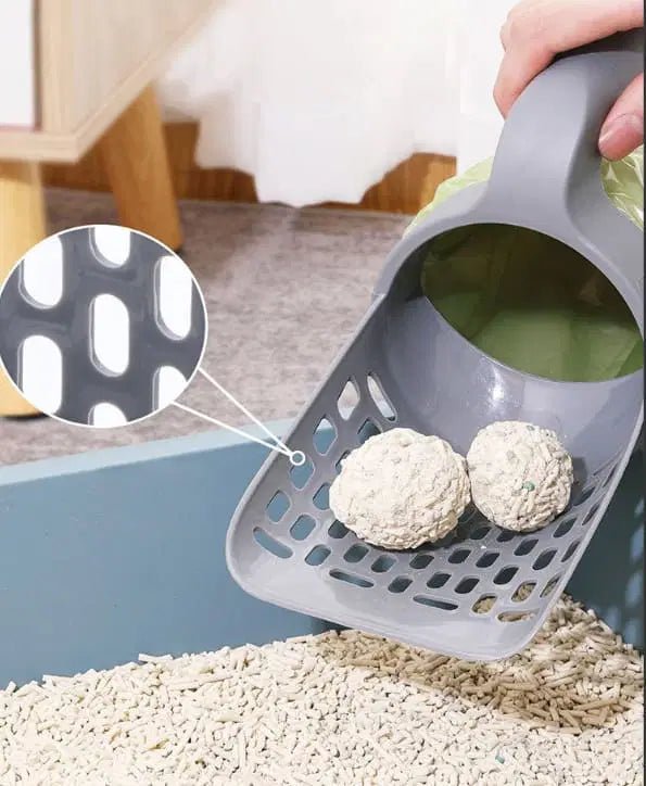 Kattenbakschepje met automatisch opvangsysteem waardoor afval direct in het zakje valt.